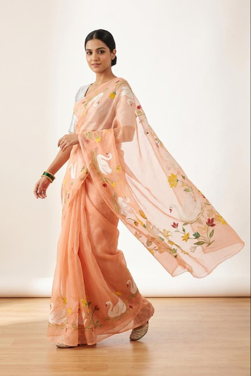 Peach bamboo Silk Saree with Rajhans Border